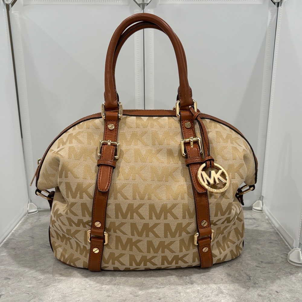 Michael Kors Brown Bedford Satchel with brown leather trim and gold accents.